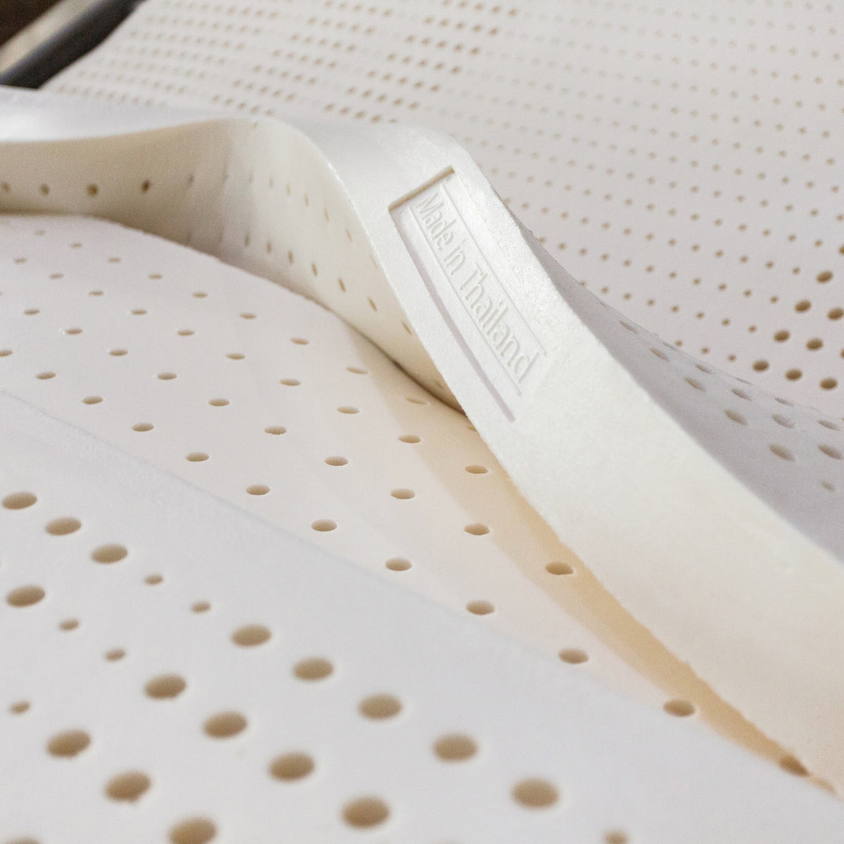 100% Natural Thai latex mattresses & toppers with 7-zone orthopedic support.